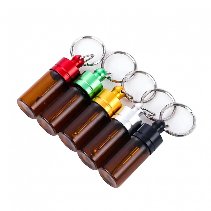 https://wegetrading.com/images/product/potable-pill-jar-keychain-2.JPG